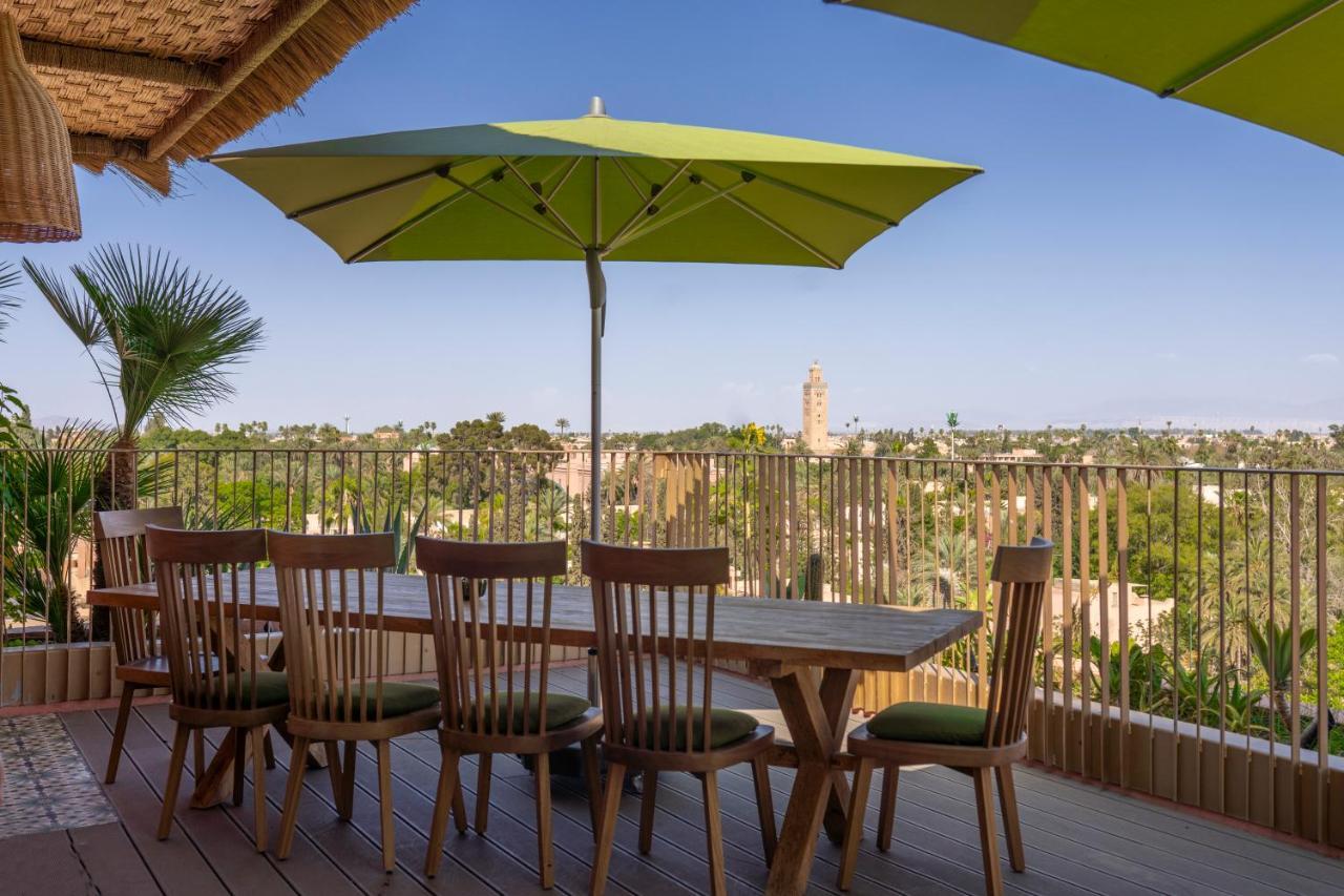 Hotel Jadali & Spa Marrakesh Luaran gambar A patio umbrella