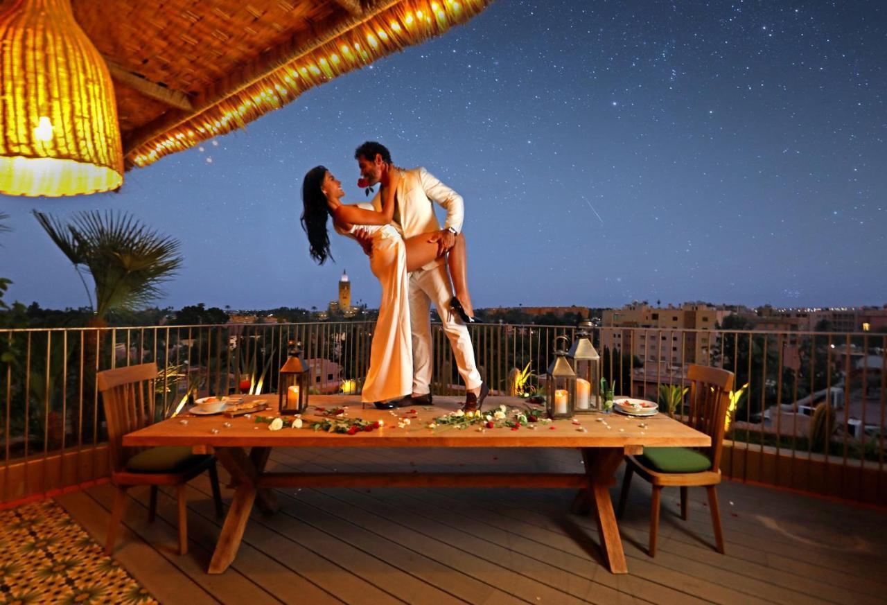Hotel Jadali & Spa Marrakesh Luaran gambar A couple dancing on a rooftop